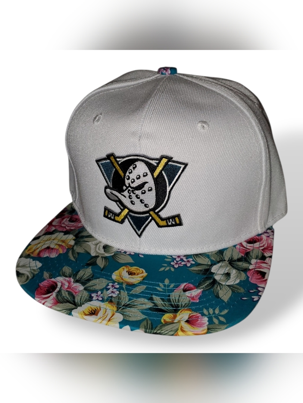 NHL White Snapback Hat with Teal Floral Brim